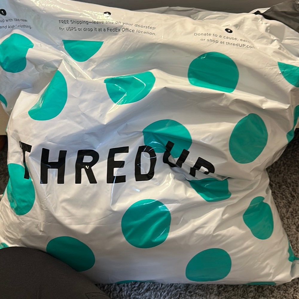 Mystery bag: free people Versace dooney and bourke, Nike, 8 pairs of jeans